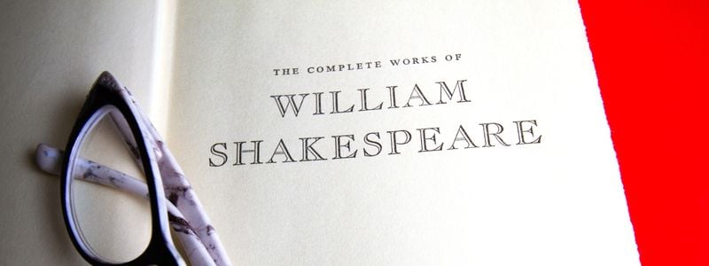 Title page of The Complete Works of William Shakespeare, with glasses on top.