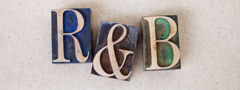 "R&B" written with block letters.