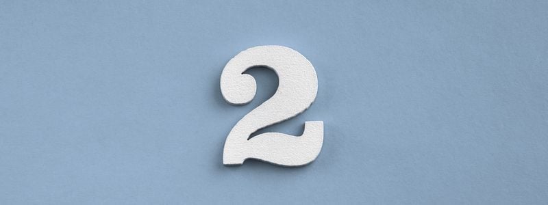 The number "2" on a blue background.