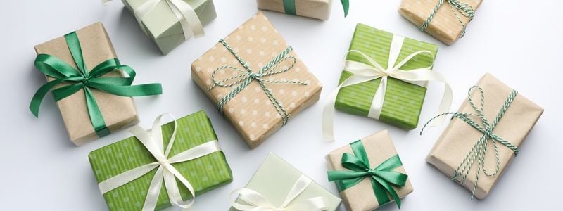 Small green, brown, and white packaged gifts.
